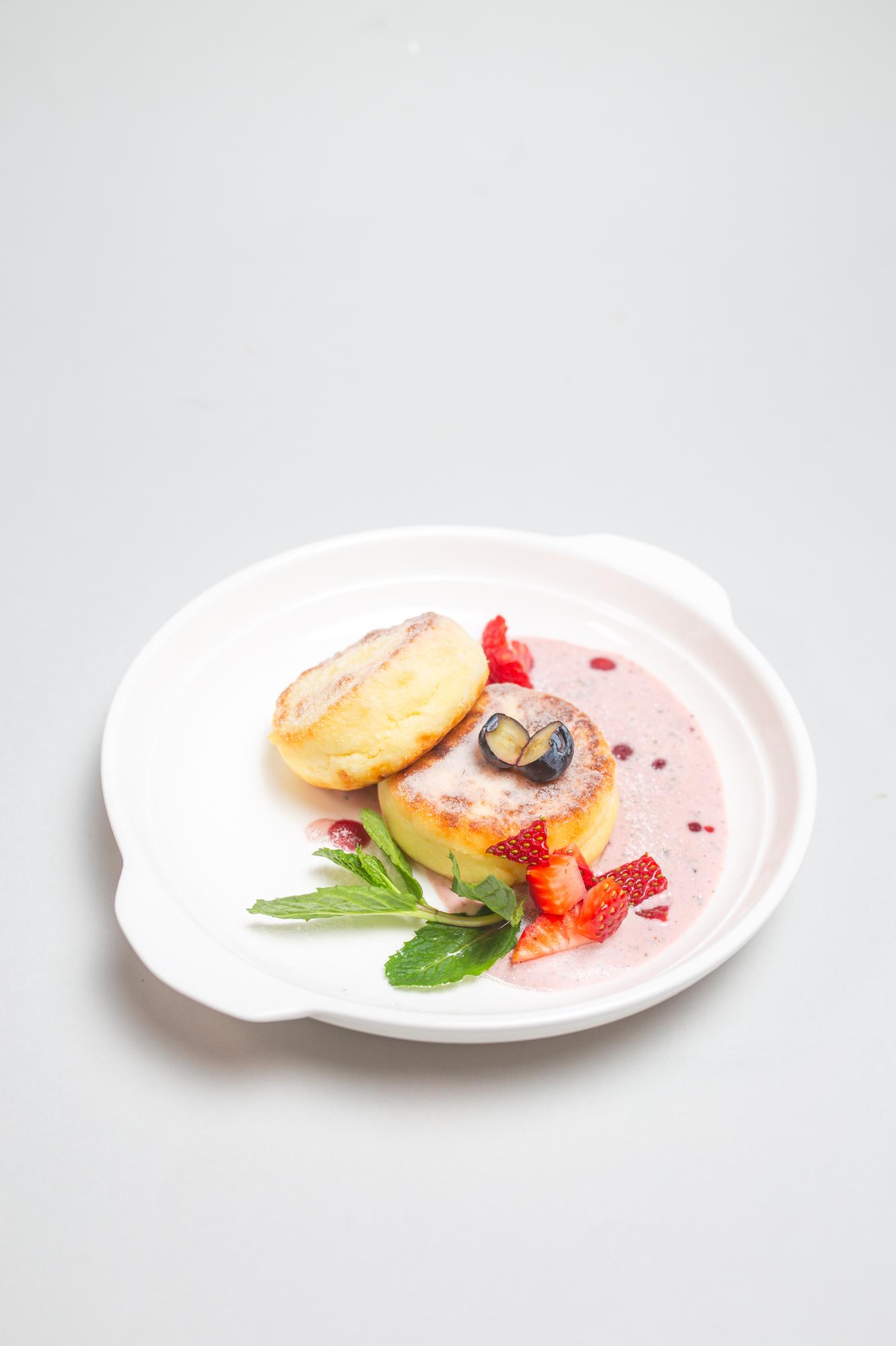 Large dish on ceramic plate with natural light